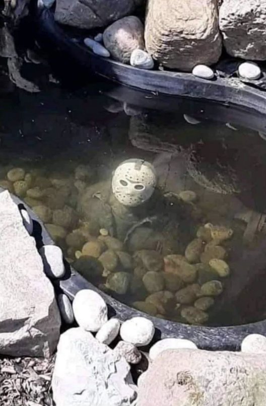 scary mask inside the water