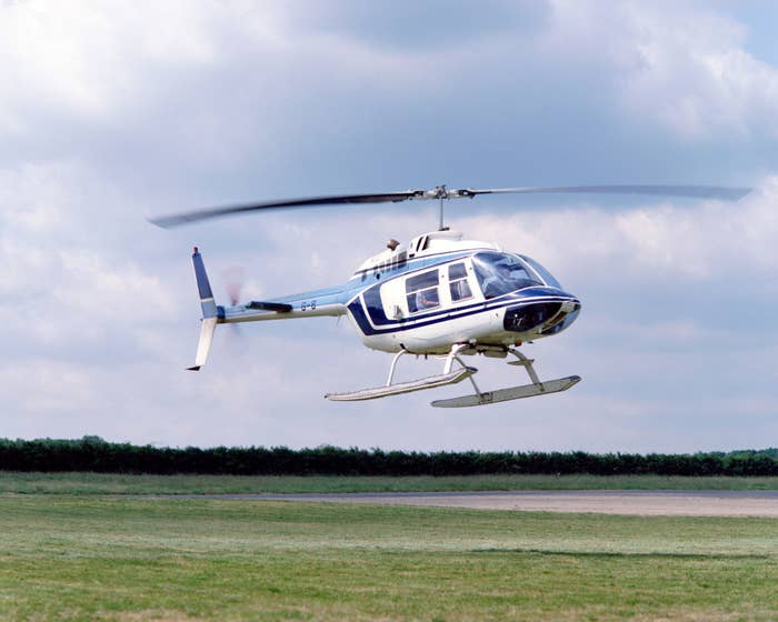 helicopter landing in a field