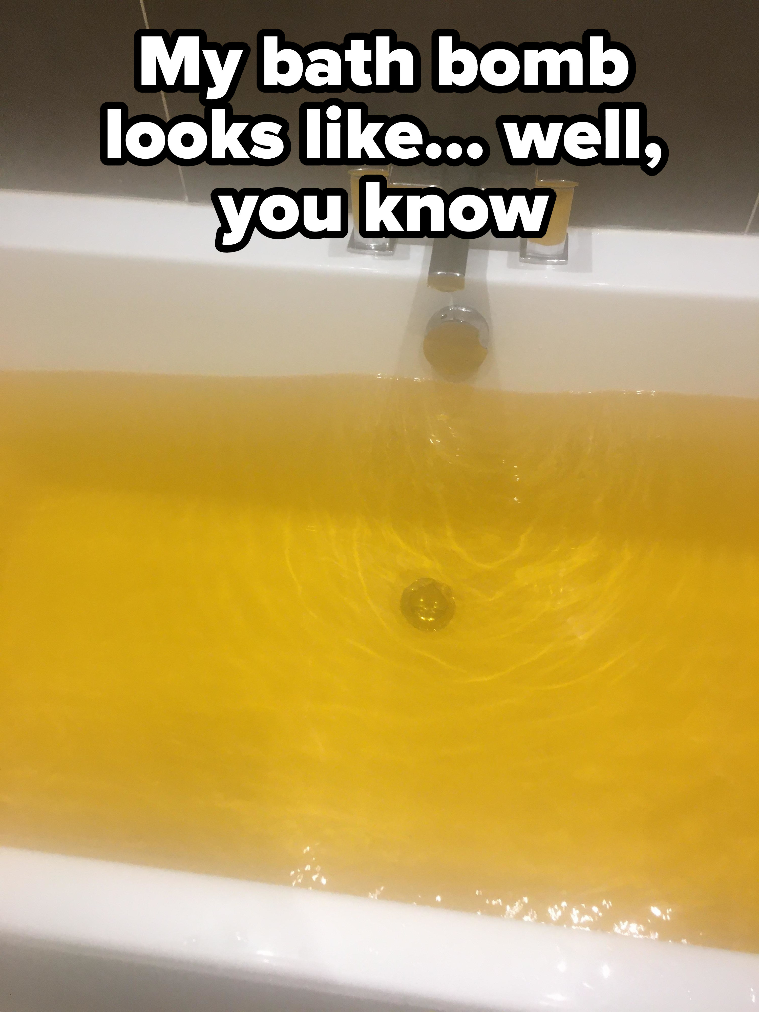 A bathtub filled with yellow water