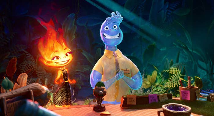 A scene from the animated film, showing characters Ember, who looks like fire, and Wade, a water character, smiling