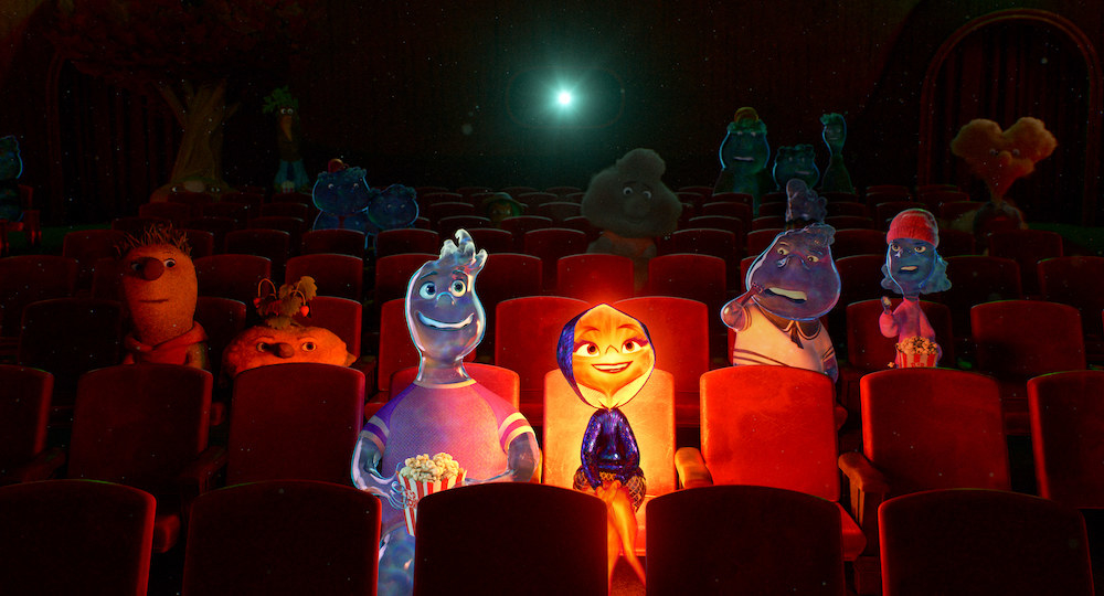 Wade and Ember sitting together in a theater