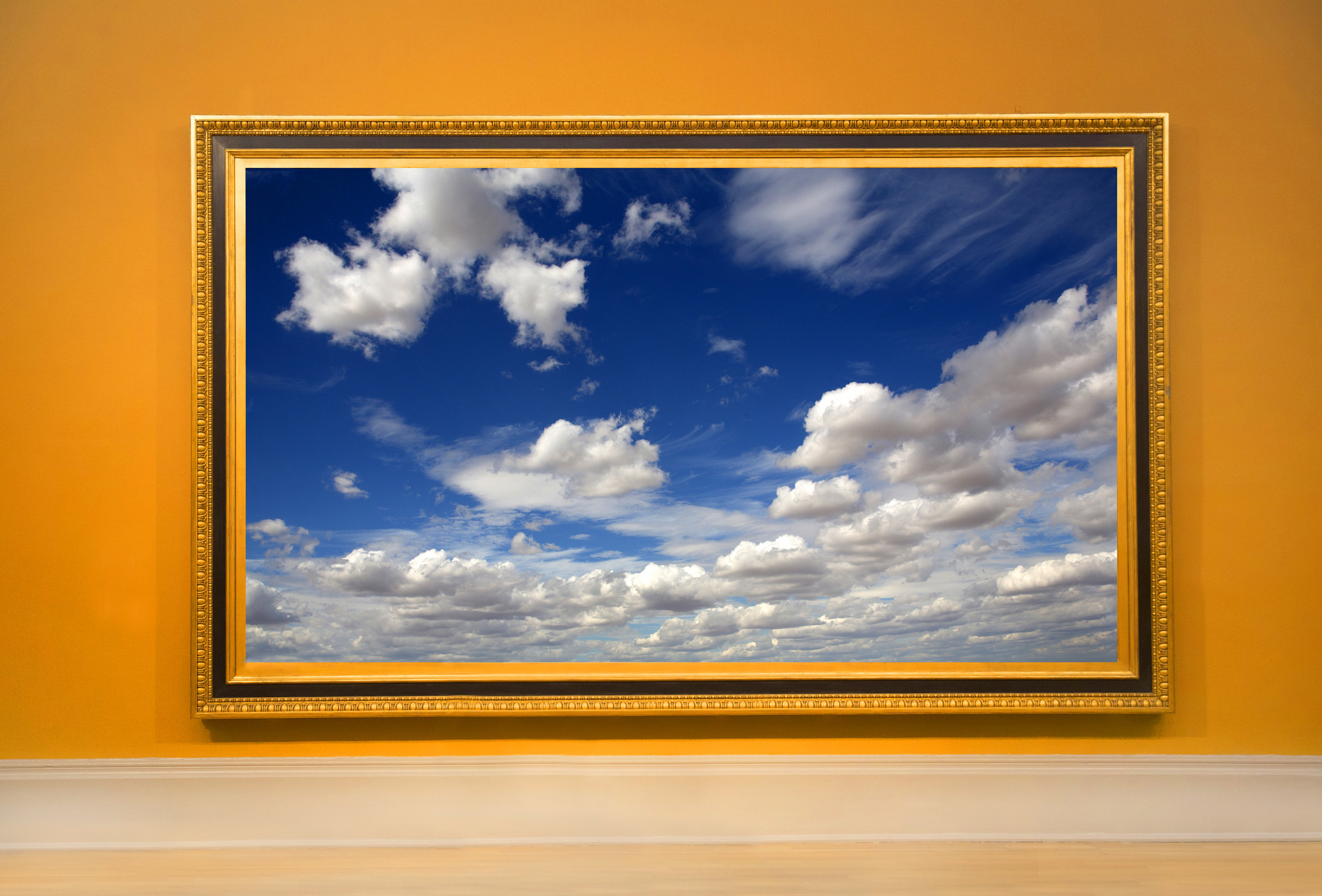A framed photo of clouds.