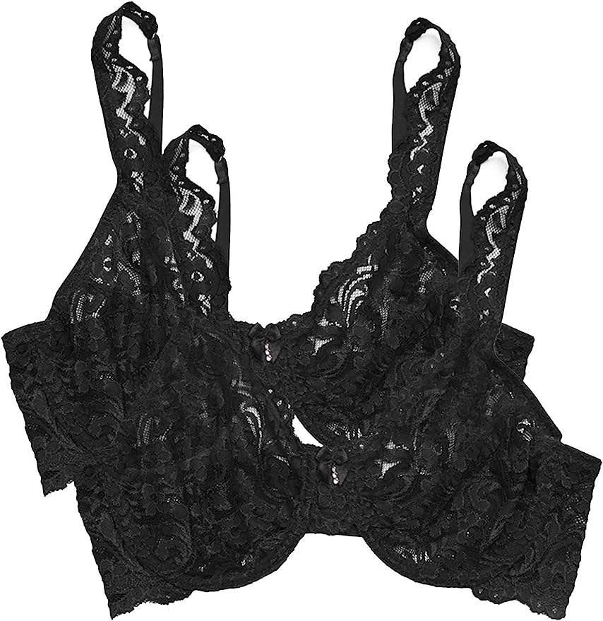 Watercolor black lace bras on hangers on white background