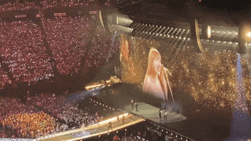 Taylor Swift performing during The Eras Tour
