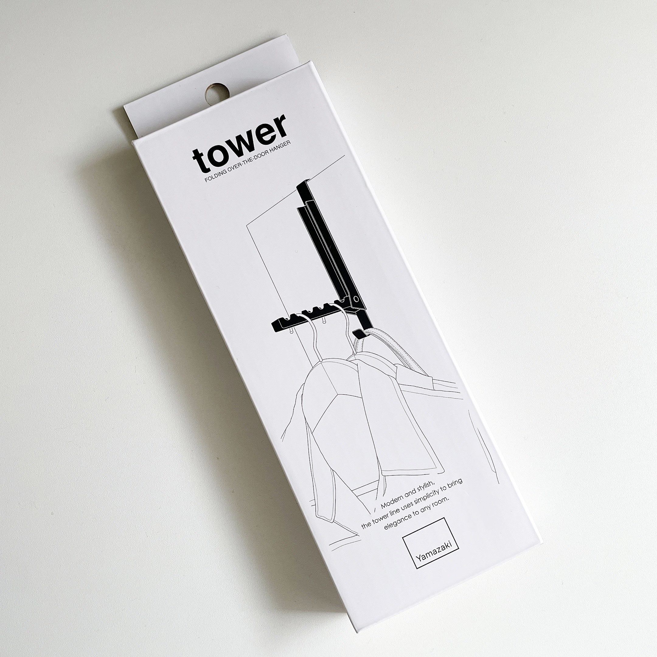 ハンズのおすすめの便利グッズ「山崎実業 タワー（tower） 使わない時は収納できるドアハンガー 5514 ホワイト」