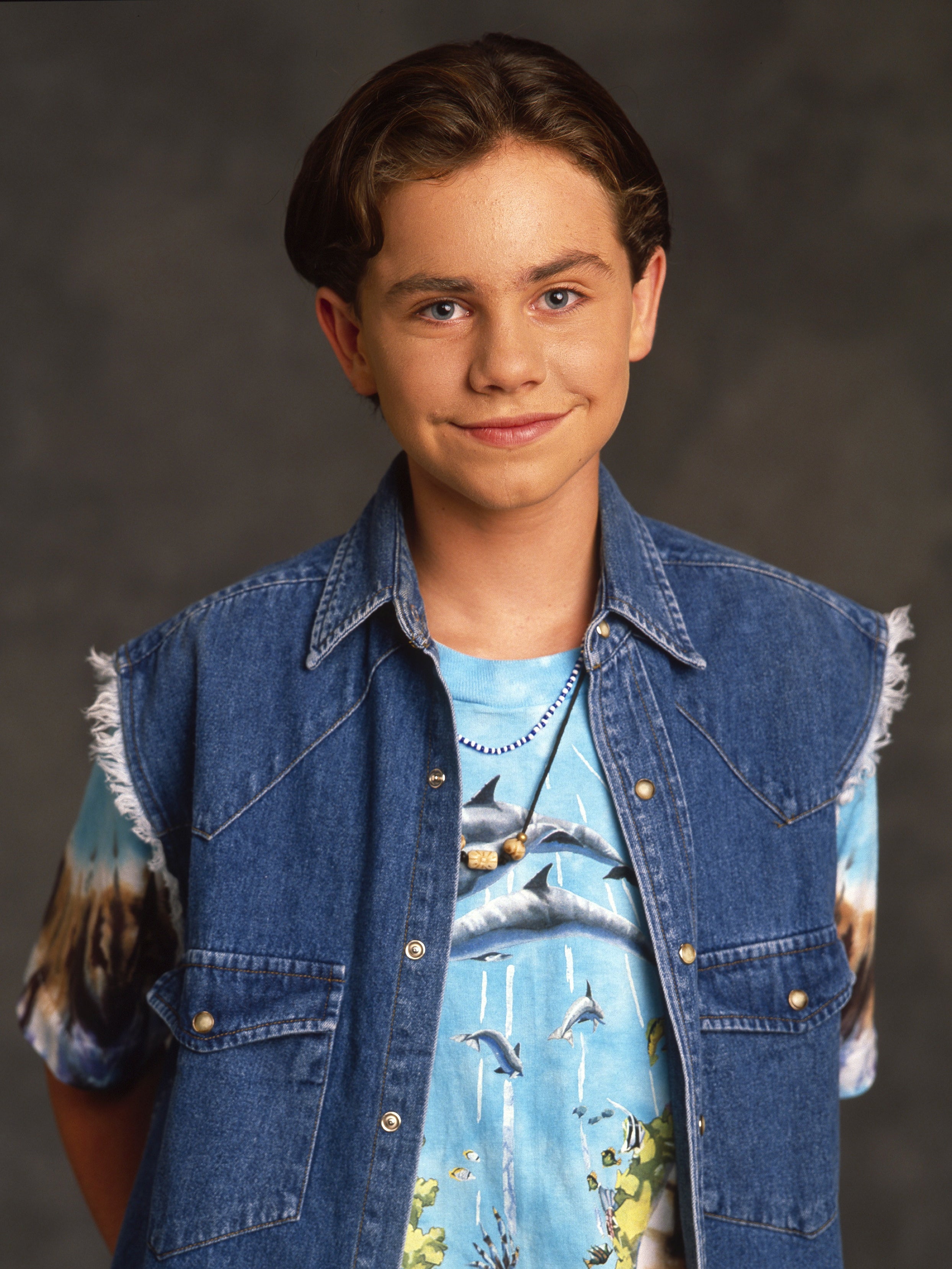 Close-up of Rider in a denim vest and shirt
