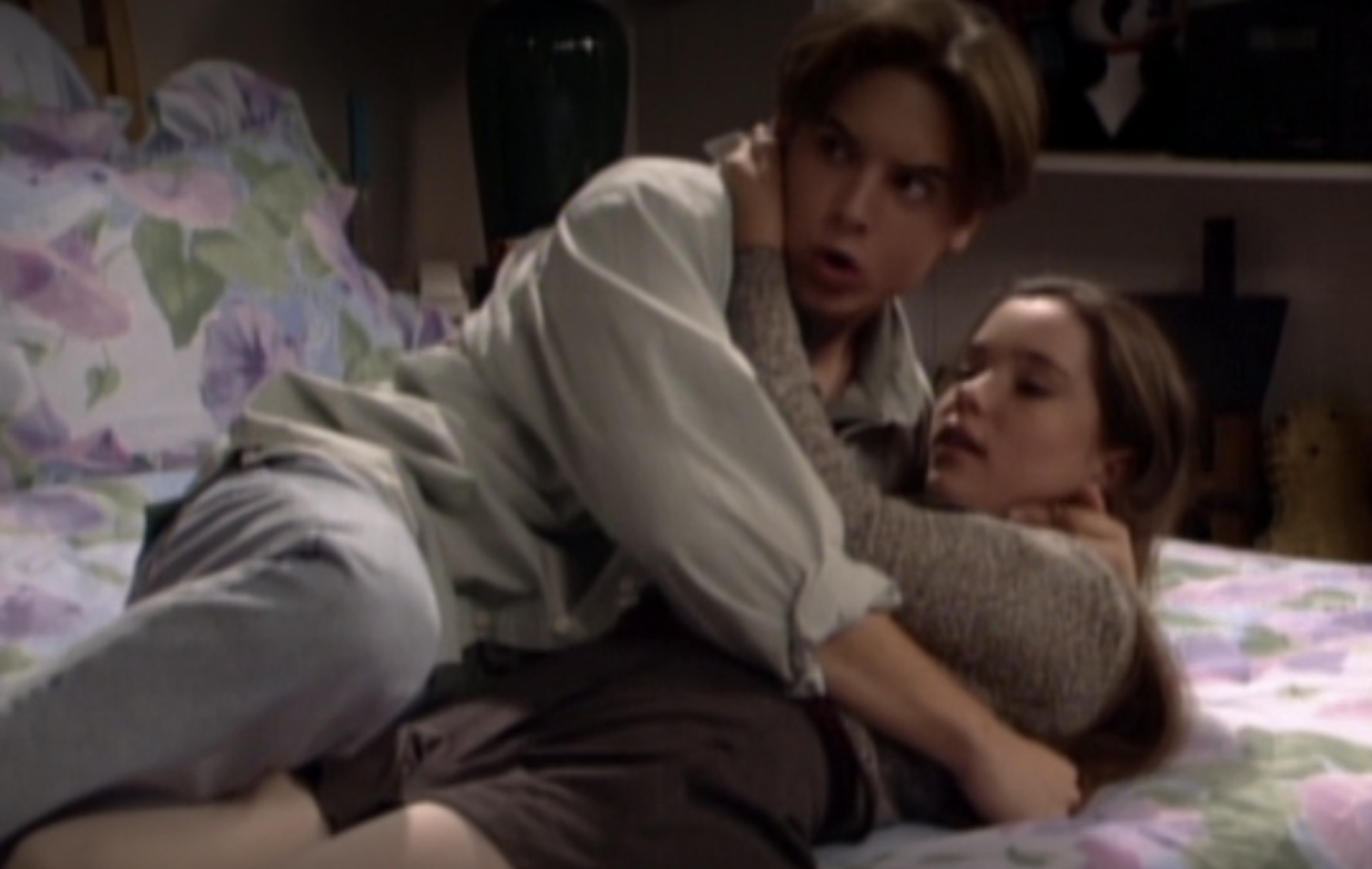 Will embracing a girl on a bed on the show