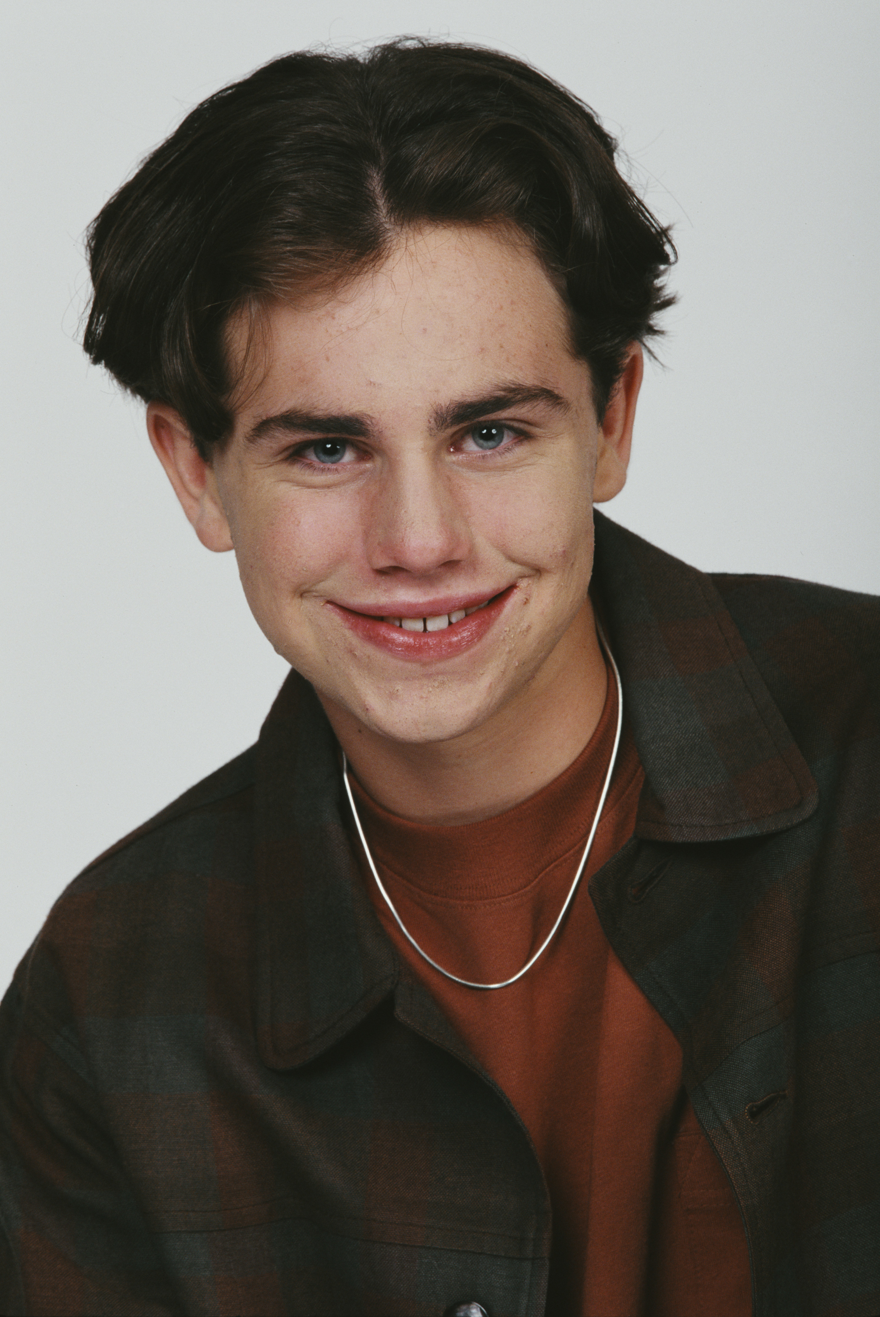 Close-up of Rider as a child, smiling