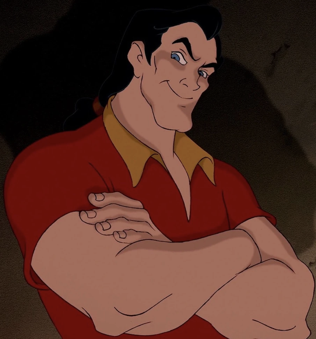 Gaston in his iconic red shirt with muscles