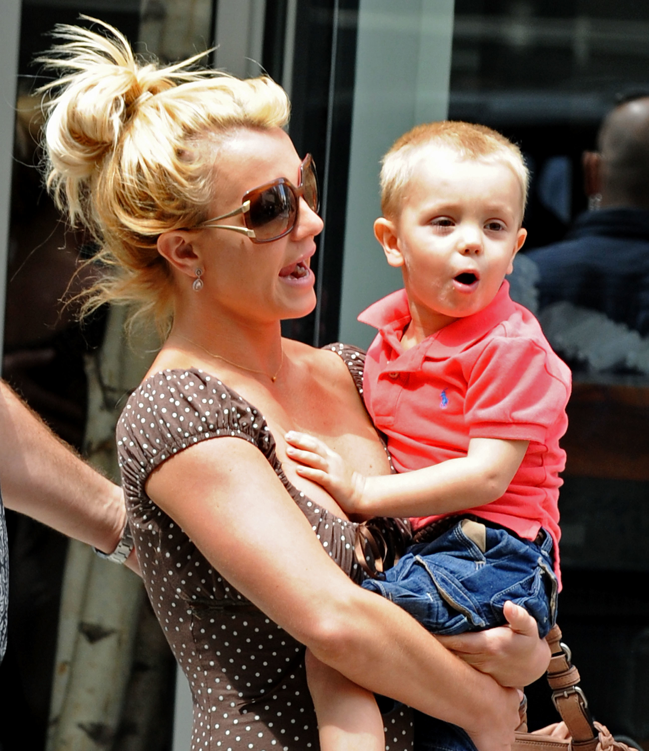 Close-up of Britney holding one of her sons