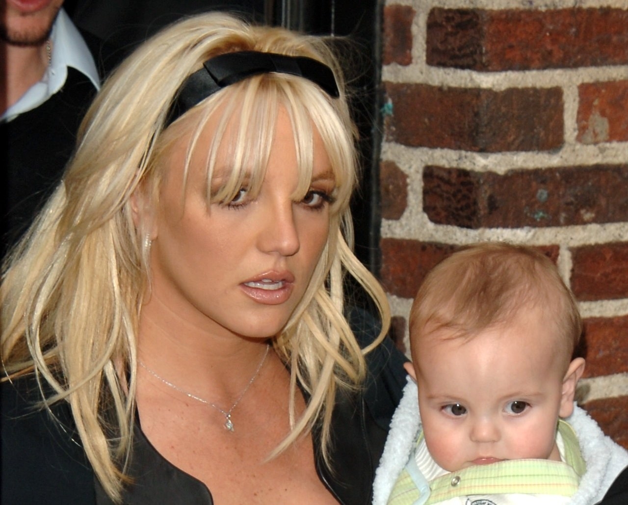 Close-up of Britney holding one of her sons