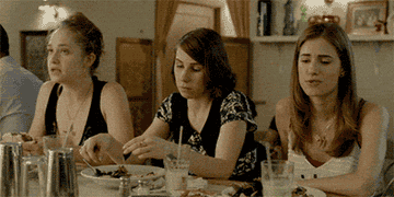 The characters from &quot;Girls&quot; eating at a restaurant.