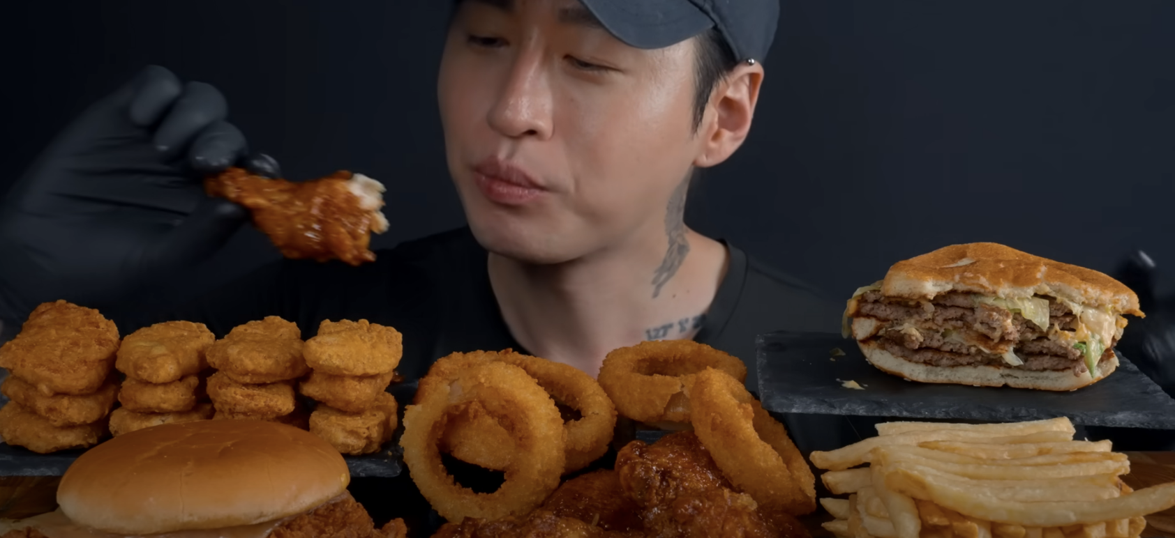 a person eating food in front of the camera