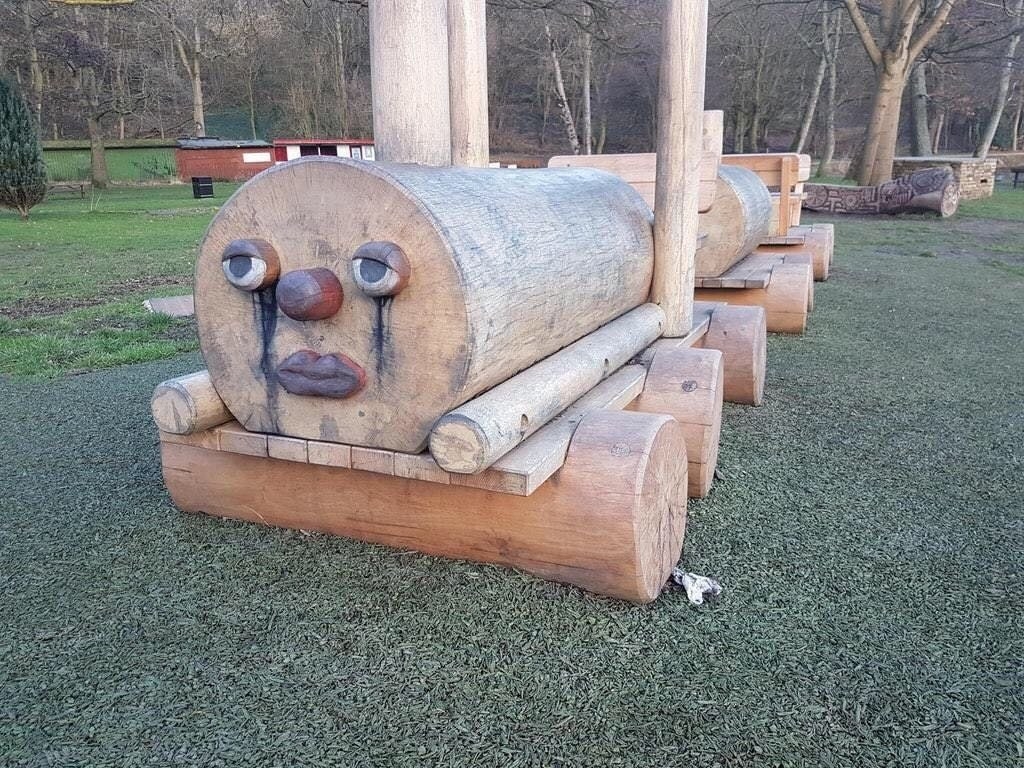 A sad looking wooden train