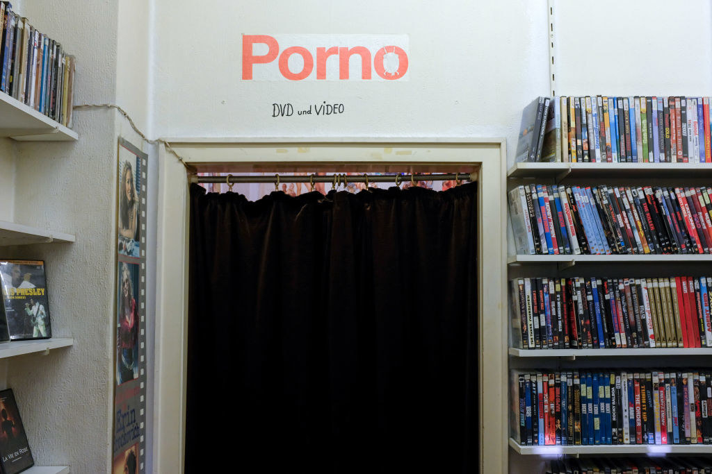 A porno room separated by a black curtain