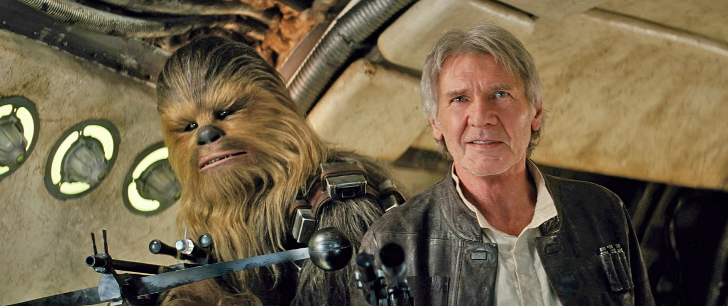 Chewbacca and an older Han Solo smile upon boarding the Millennium Falcon