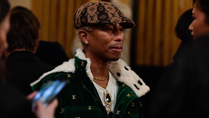 Pharrell wearing Louis Vuitton