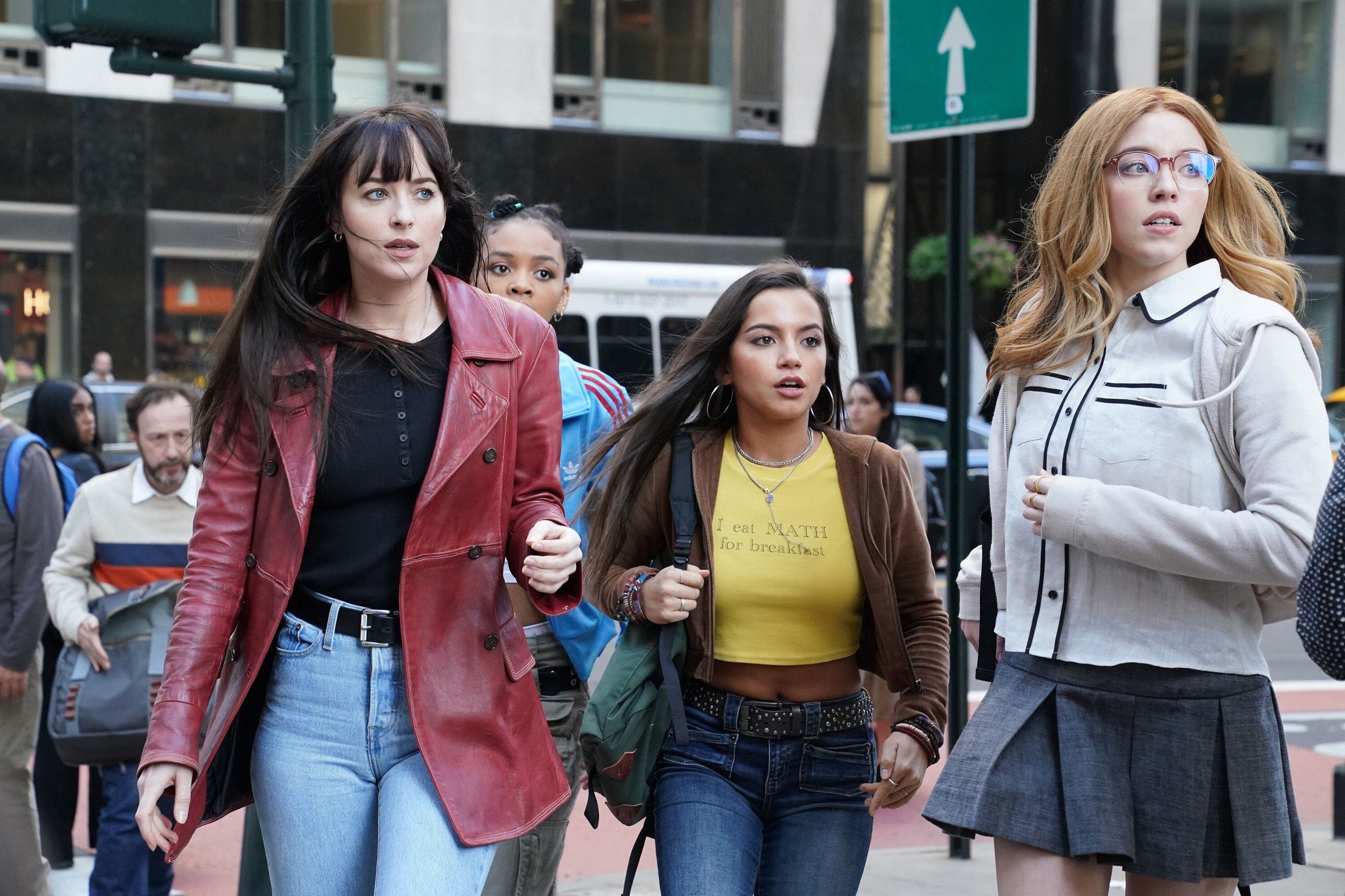 Dakota Johnson, Sydney Sweeney, Isabel Merced and Celeste O&#x27;Connor spot something concerning in a scene from &quot;Madame Web&quot;