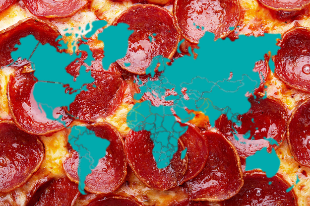 the world map on top of a pepperoni pizza 