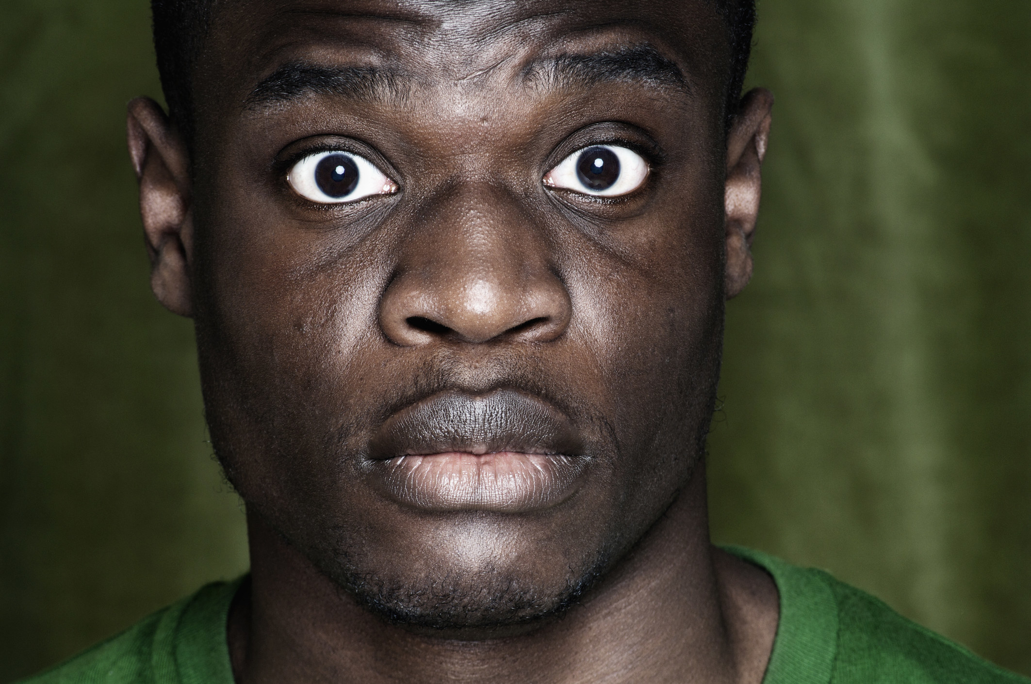 Closeup of a man with a surprised expression