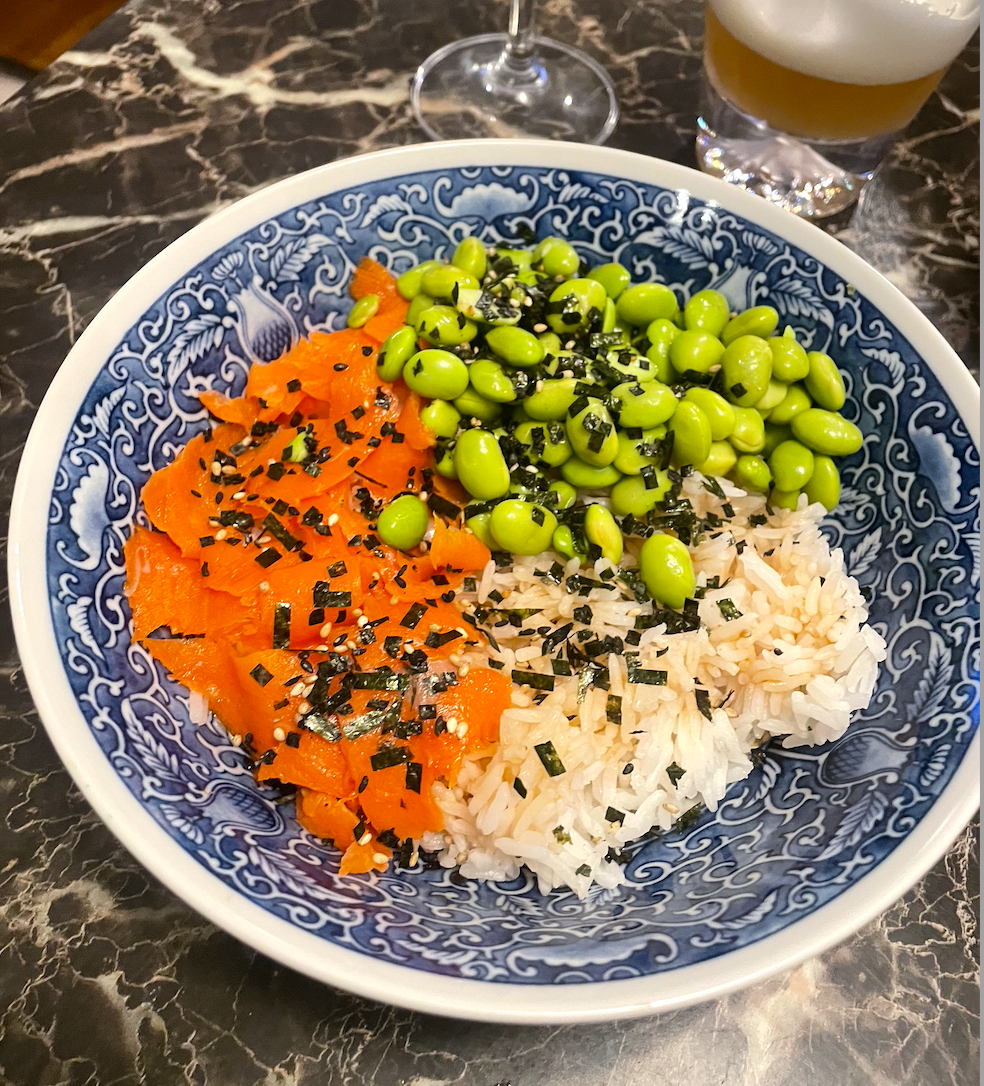 bowl with rice, salmon, and edamame