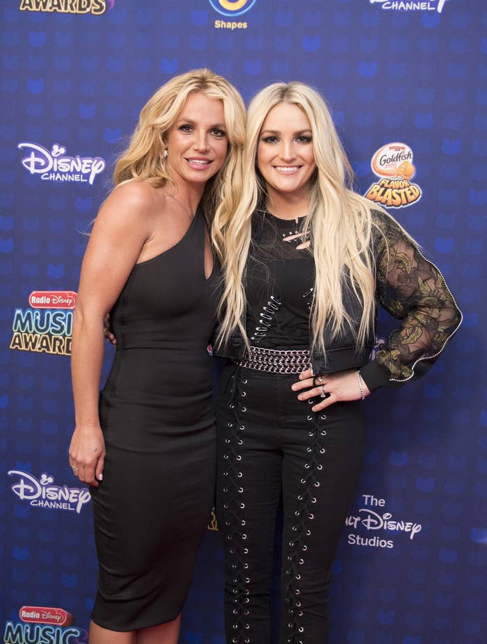 The Spears sisters smiling on the red carpet