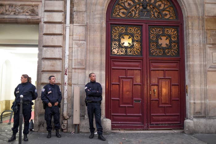 Police standing outside a building