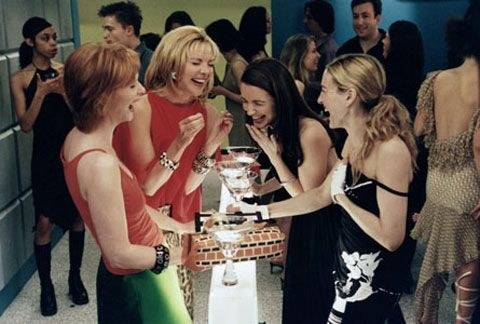 carrie and her friends drinking at a club