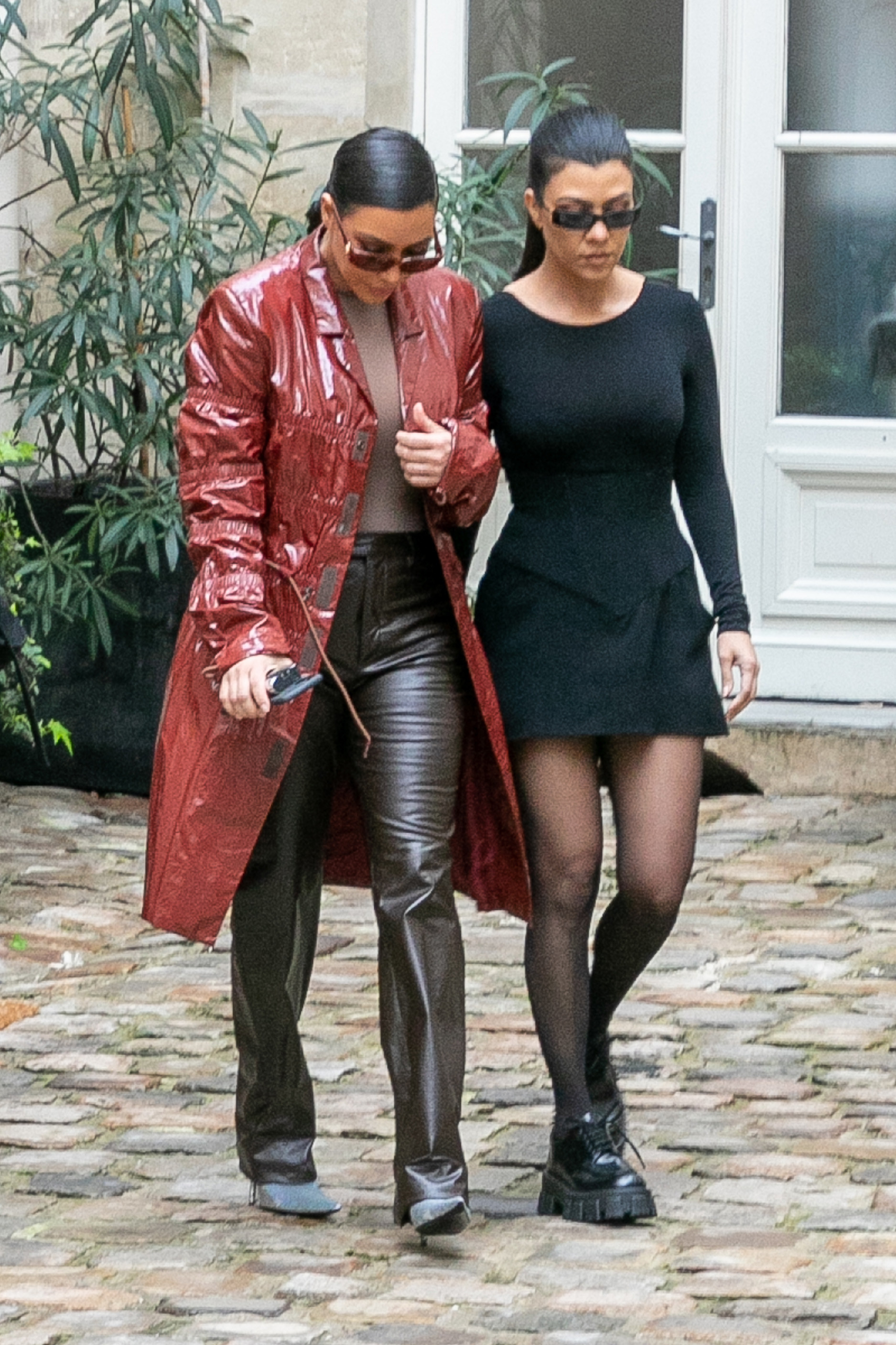 Kim and Kourtney walking together