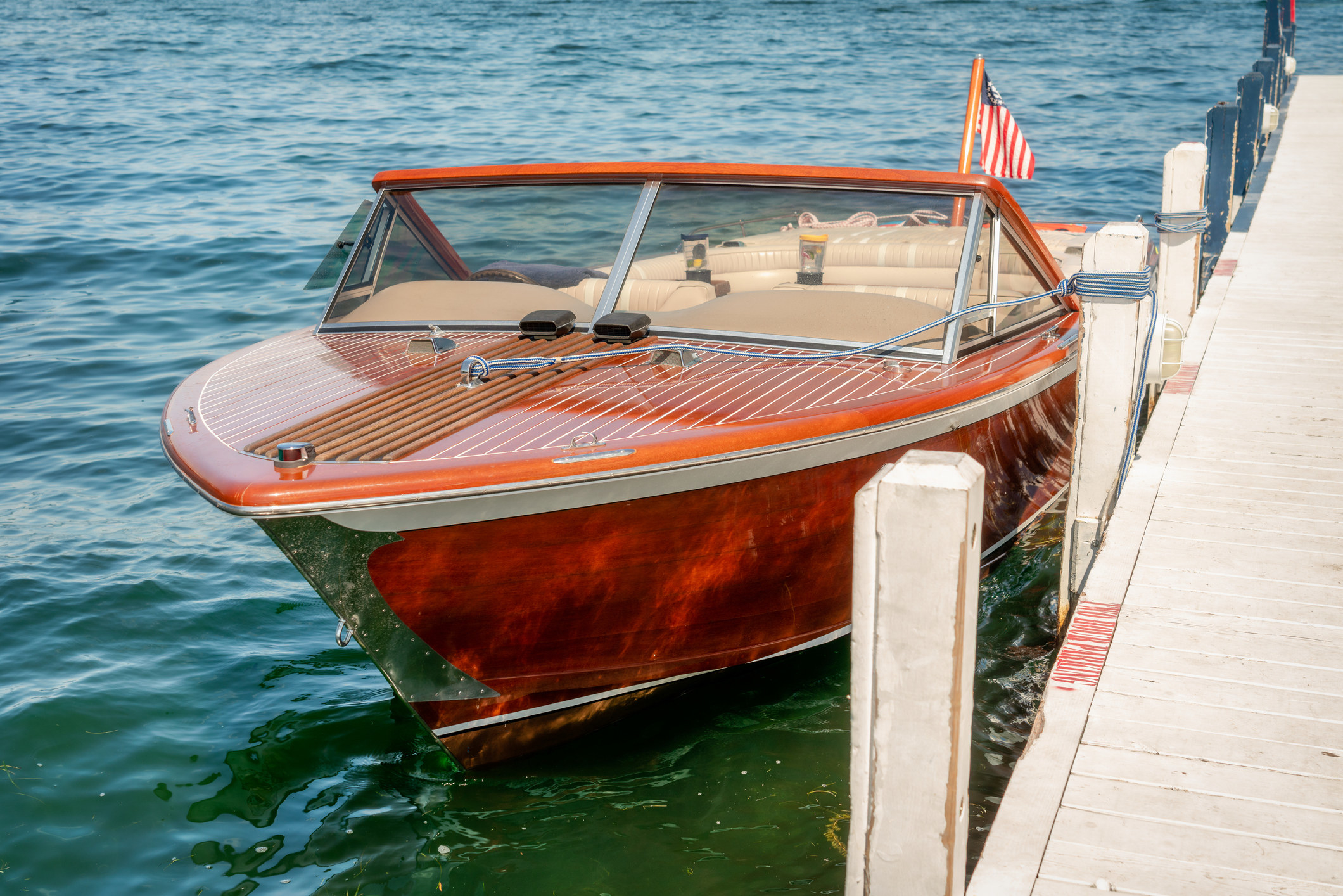 Wood boat at dock.