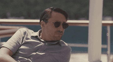 Roman from &quot;Succession&quot; raising his eyebrows.