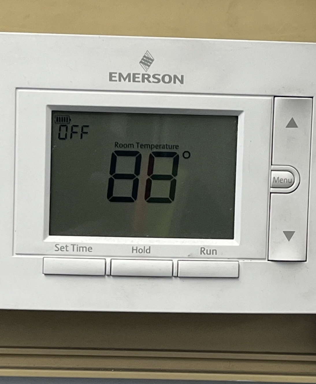 A thermostat set at 88 degrees