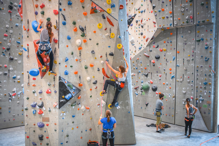 People at a rock climbing gym