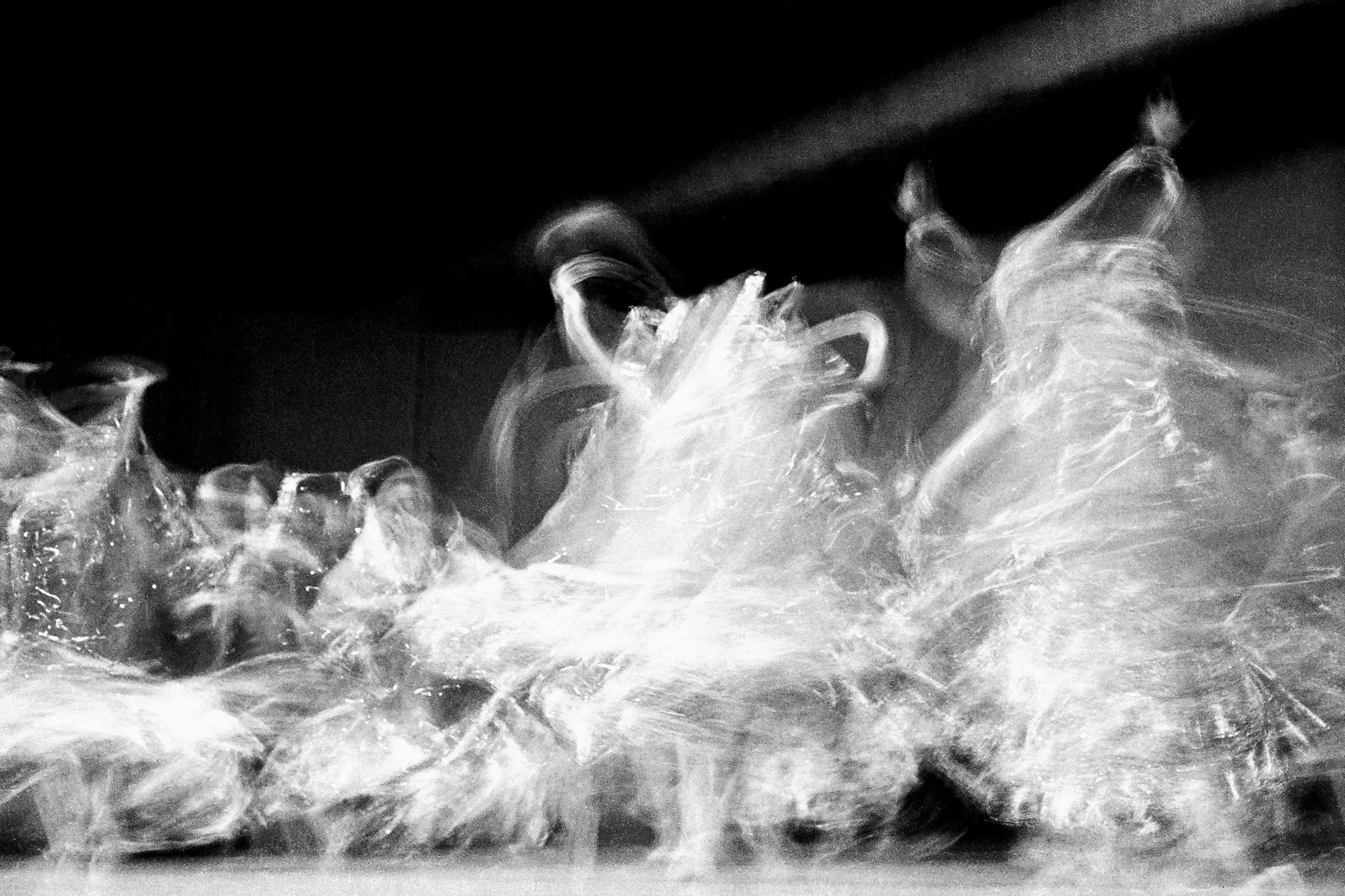 black and white motion photos of people dancing