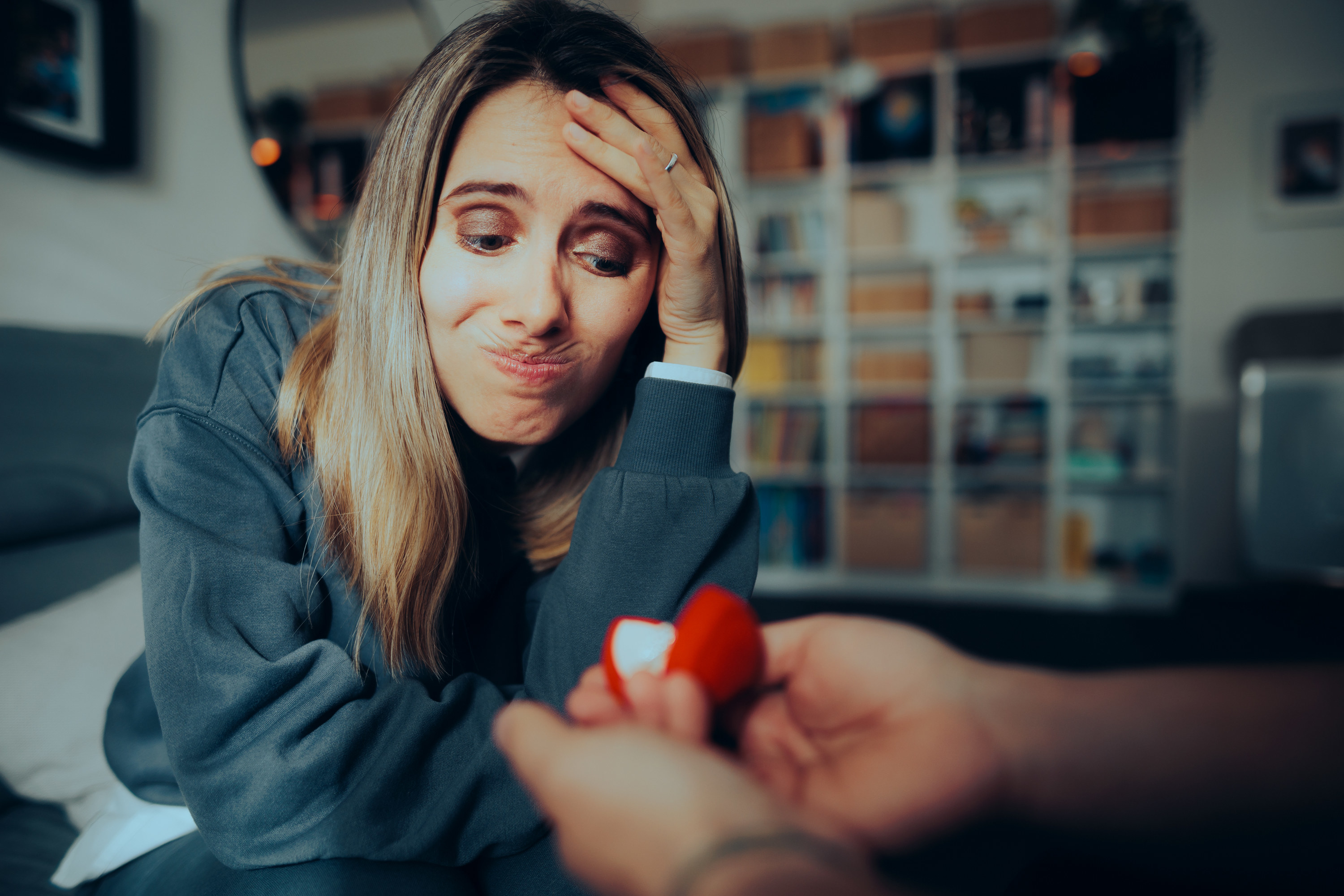 stressed woman refusing a gift