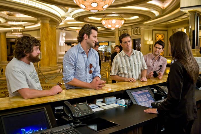 Zach Galifianakis, Bradley Cooper, Ed Helms, and Justin Bartha checking into the hotel in The Hangover