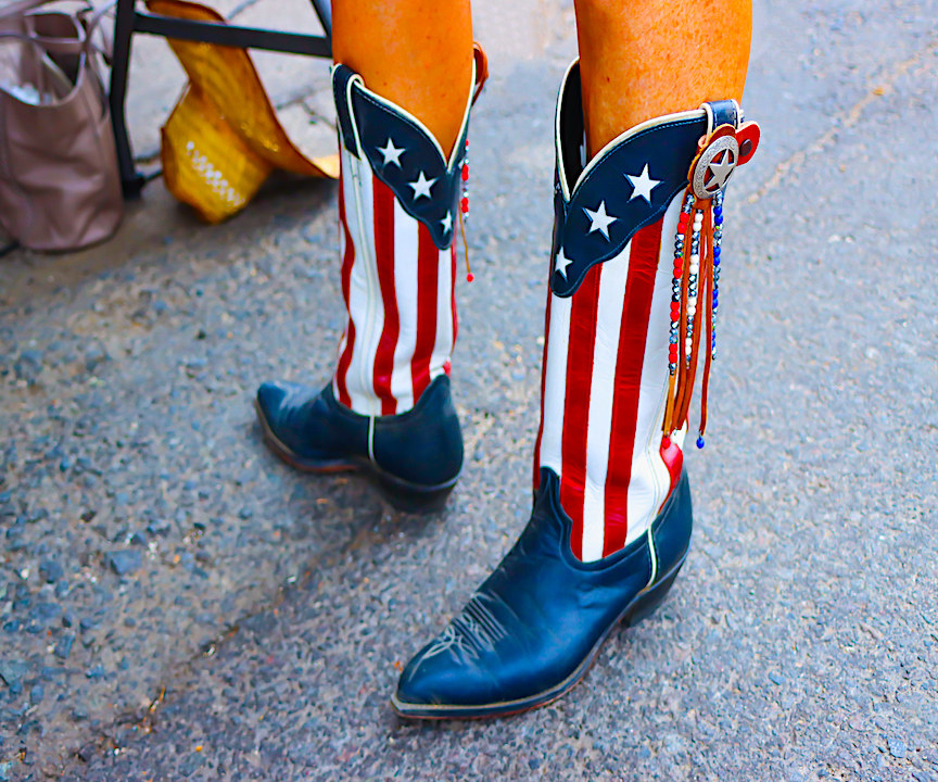 Closeup of someone&#x27;s cowboy boots