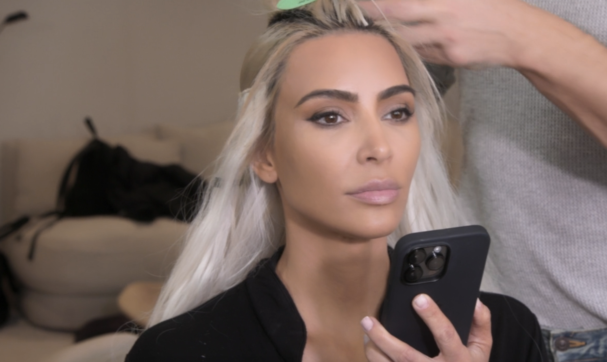 Closeup of Kim Kardashian on her phone