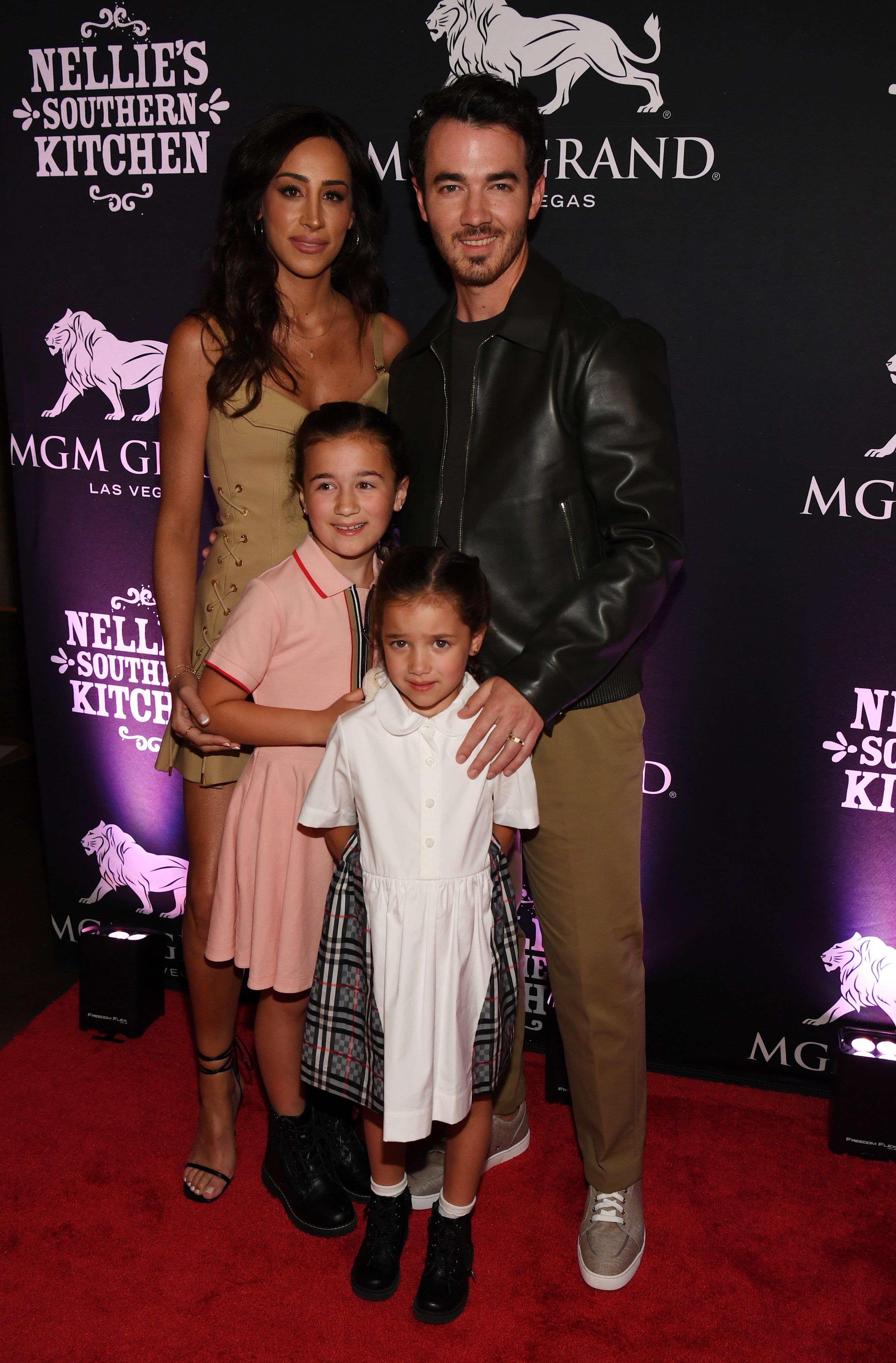 Kevin with his family on the red carpet