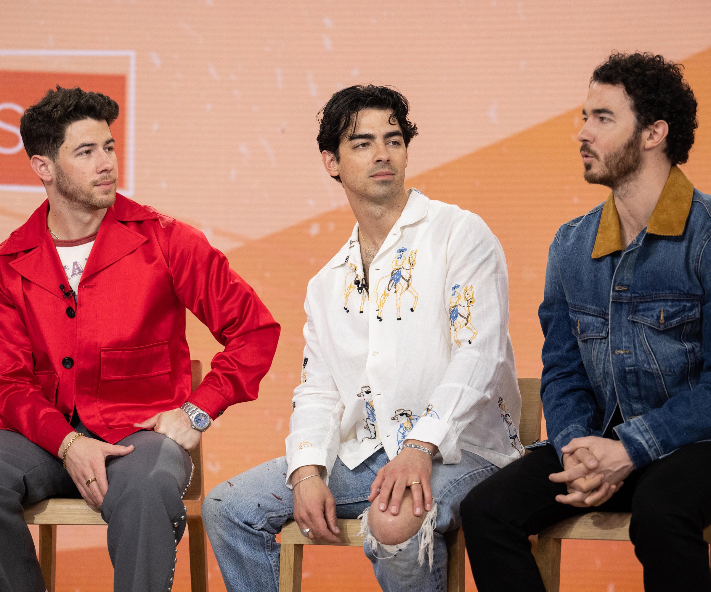 The three brothers sitting together