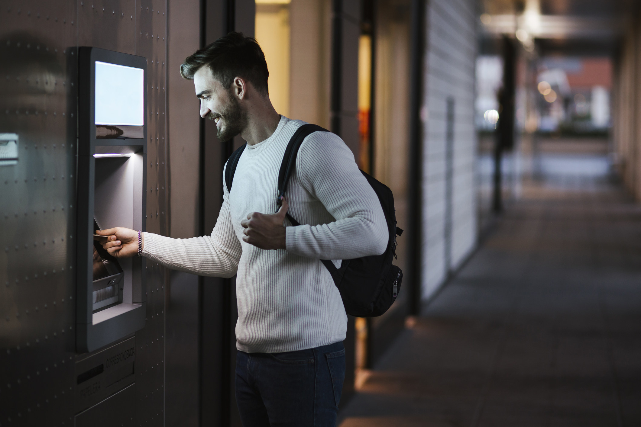 A man using an ATM