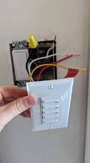 installing a timer switch in the wall