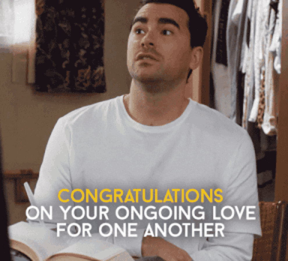gif of character from schitt&#x27;s creek saying congratulations on your ongoing love for each other. you did it.