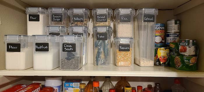 Reviewer&#x27;s pantry with containers storing dried goods and labeled