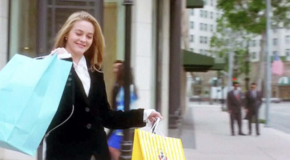 Cher from &quot;Clueless&quot; walking with shopping bags