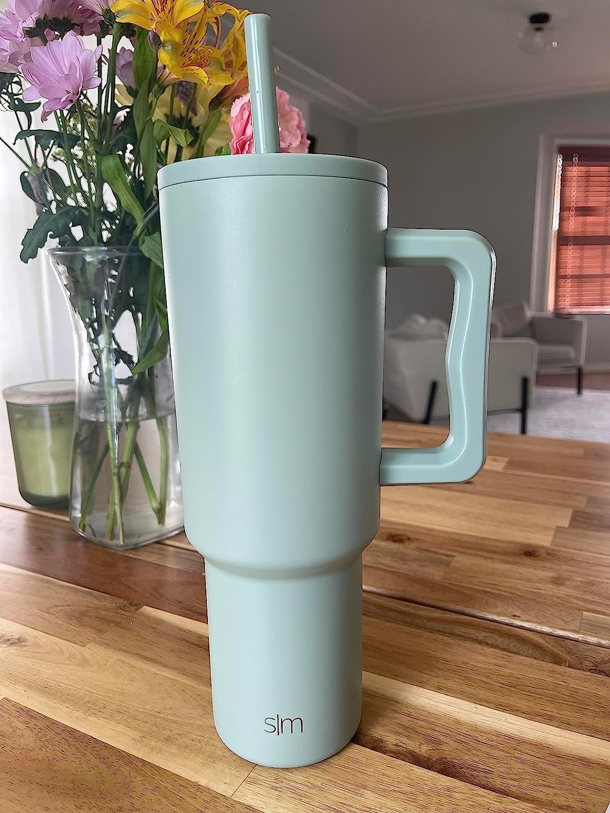 The teal tumbler with straw