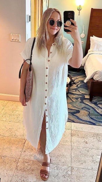 Reviewer wearing the white cover-up