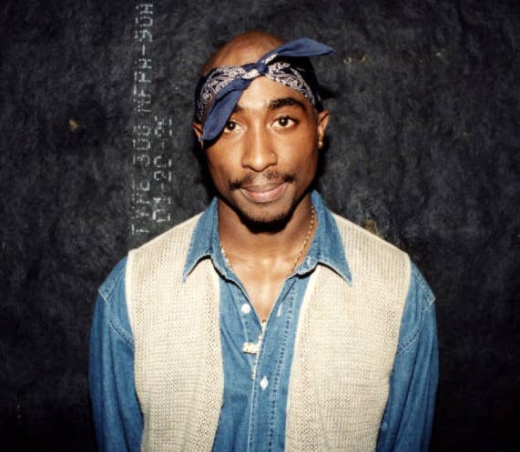 Tupac wearing a blue bandana wrapped around his head