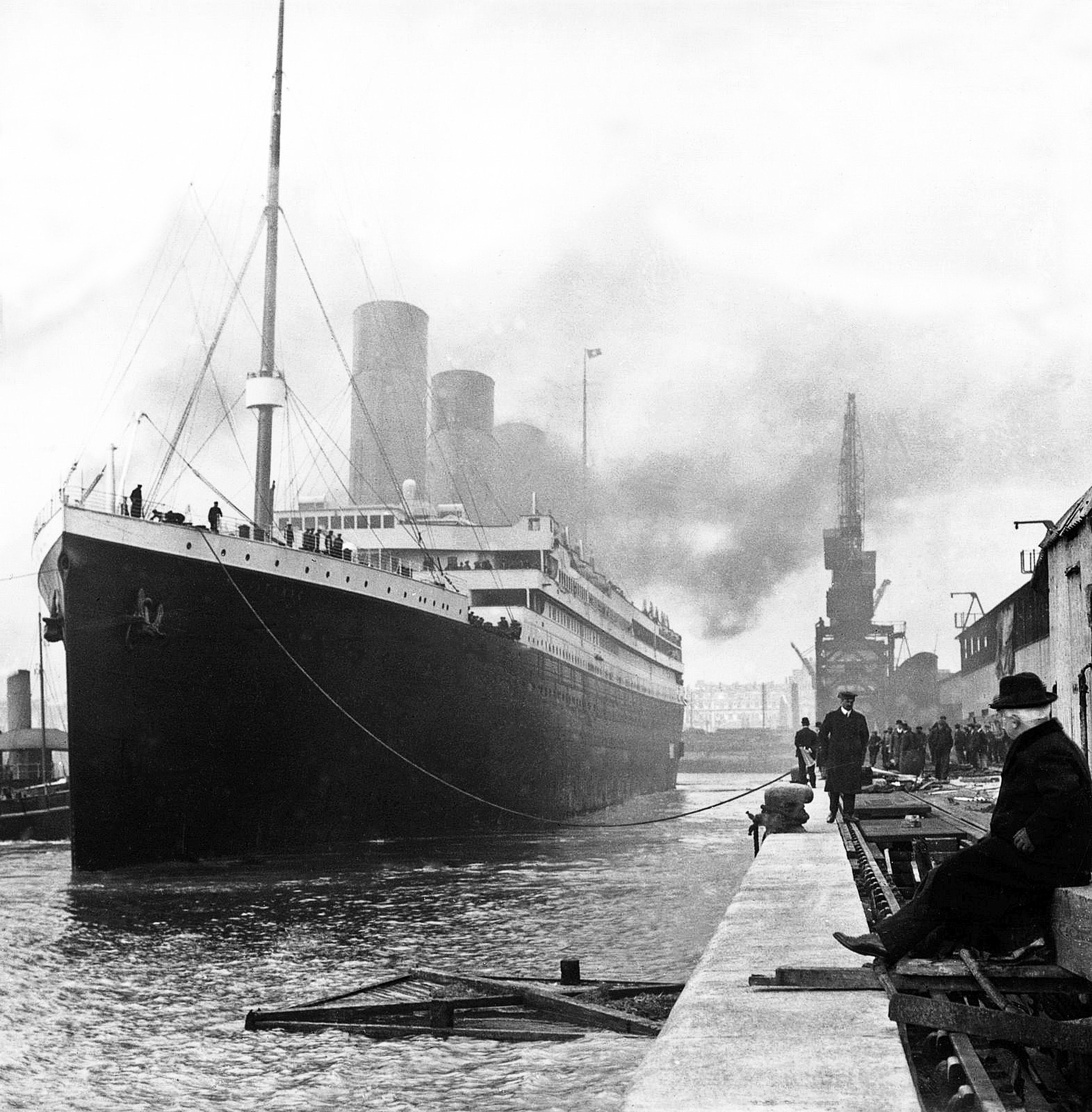 Black-and-white photo of the docked Titanic