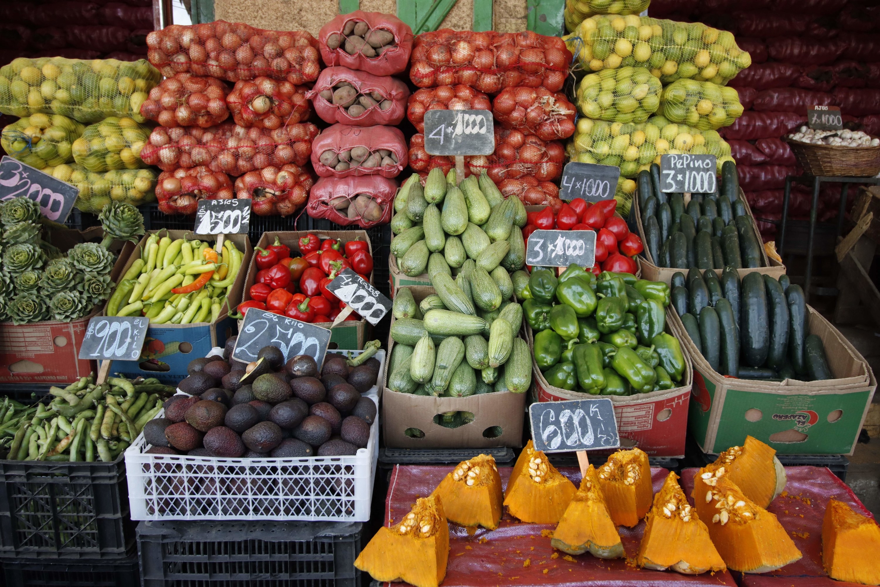 Fruits and vegetables are displayed at a market